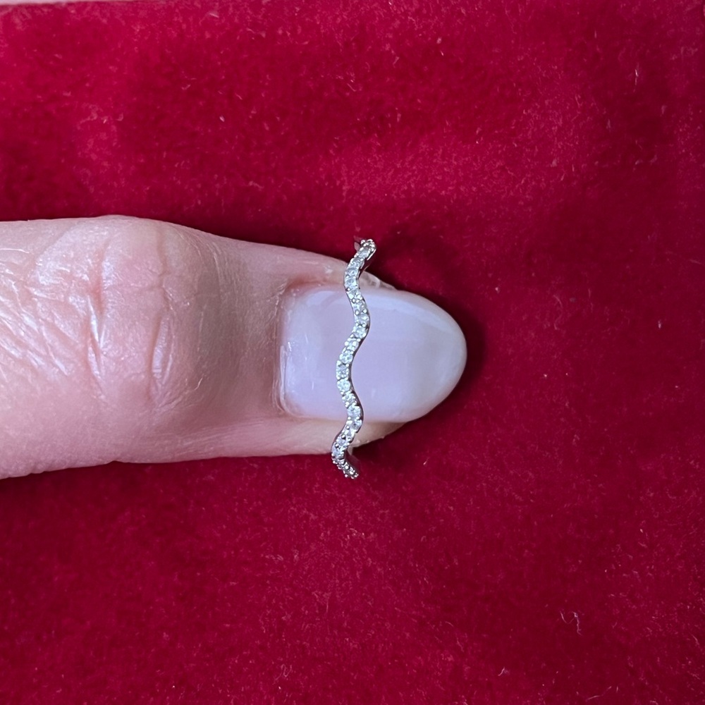 Dainty wavy half pave with diamond ring stacker